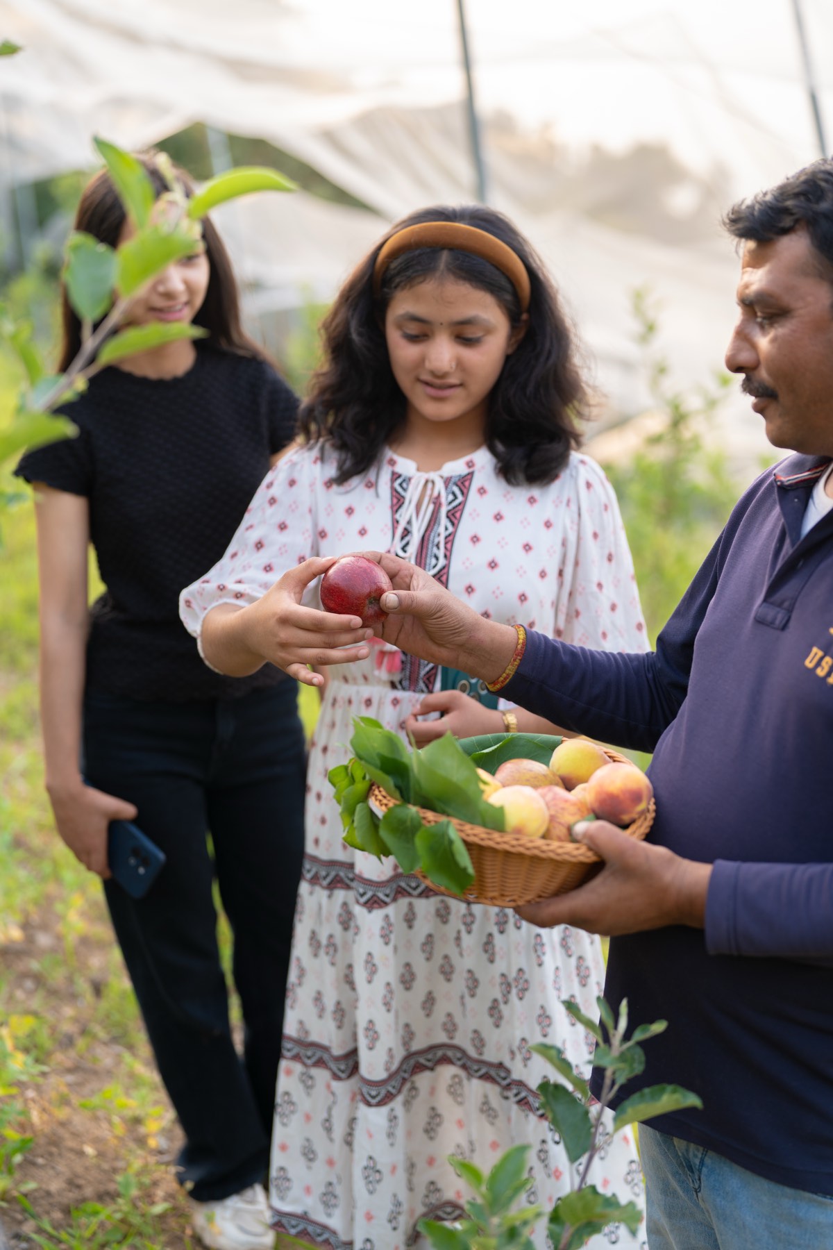Sharing fresh-picked fruit